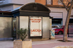 Real photo kiosk billboard mockup PSD on metal street kiosk with natural light