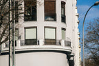 Real photo corner building billboard mockup PSD with natural light and city architecture