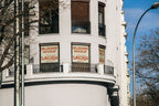 Real photo corner building billboard mockup PSD with natural light and city architecture