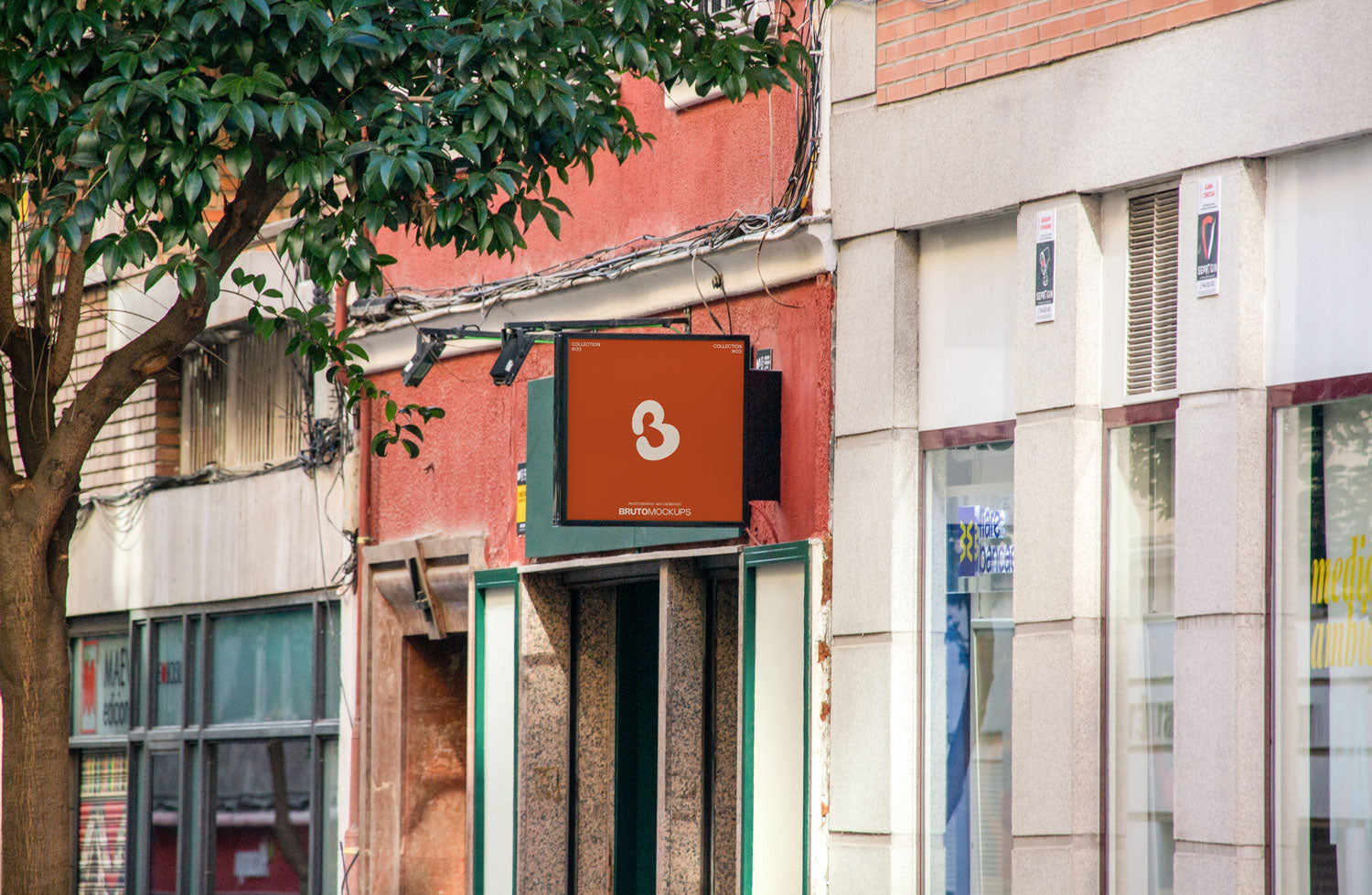 Real photo storefront square logo sign mockup on city street with natural light and shadows
